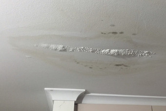 Water damage to ceiling from roof